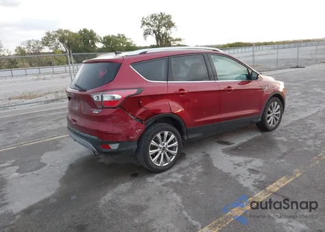 2017 Ford Escape Titanium z USA, uszkodzony, nr VIN 1FMCU0JD7HUA49313